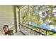 Enjoy the serene lake view from the screened balcony, perfect for relaxing in a peaceful setting at 2314 Mid Town Ter # 1126, Orlando, FL 32839