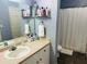 Relaxing bathroom features a vanity with storage and a shower-tub combo at 2314 Mid Town Ter # 1126, Orlando, FL 32839