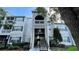 Well-maintained building with inviting stairwell to each unit, close to parking at 2314 Mid Town Ter # 1126, Orlando, FL 32839
