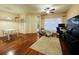 This cozy living area provides wood flooring, neutral walls, and ample sunlight at 2314 Mid Town Ter # 1126, Orlando, FL 32839