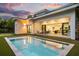 A stunning outdoor space featuring a private pool and seamless transition to indoor living area at 2412 Chantilly Ave, Winter Park, FL 32789