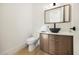 Contemporary half-bathroom with modern vanity, vessel sink, and elegant fixtures at 2412 Chantilly Ave, Winter Park, FL 32789