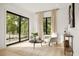 Inviting living room with large windows offering scenic outdoor views at 2412 Chantilly Ave, Winter Park, FL 32789