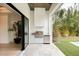 Outdoor kitchen features stainless steel grill, sink, and modern cabinetry at 2412 Chantilly Ave, Winter Park, FL 32789