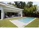 Beautiful pool and patio with outdoor living area and grilling at 2412 Chantilly Ave, Winter Park, FL 32789