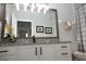 Bathroom featuring granite countertop vanity, gray hardware, and modern fixtures at 2778 Almaton Loop # 302, Kissimmee, FL 34747