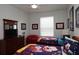 Bright bedroom with two beds, playful themed bedding, and cozy decor providing a comfortable and inviting space at 2778 Almaton Loop # 302, Kissimmee, FL 34747