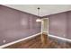This dining room has wood floors and a hanging light fixture at 2809 Pioneer Rd, Orlando, FL 32808