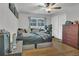 Bedroom with a ceiling fan, closet, and natural light at 300 Hickory Ct, Apopka, FL 32712