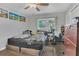 This bedroom has a window for natural light and a spacious closet for storage at 300 Hickory Ct, Apopka, FL 32712