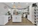 Well-equipped kitchen with modern appliances, granite countertops, and ample storage space at 300 Hickory Ct, Apopka, FL 32712