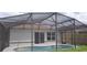 Screened-in pool area and well-maintained backyard with lots of privacy at 3156 Natoma Way, Orlando, FL 32825