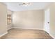 Bright bedroom with hardwood floors, lots of natural light and neutral colored walls at 325 Forestway Cir # 104, Altamonte Springs, FL 32701
