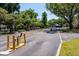 Exterior view of a gated community with mature trees and lush landscaping at 325 Forestway Cir # 104, Altamonte Springs, FL 32701