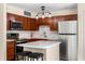 Modern kitchen with stainless steel appliances and eat-in island at 325 Forestway Cir # 104, Altamonte Springs, FL 32701