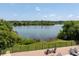 Enjoy a picturesque lake view from the deck at 325 Forestway Cir # 104, Altamonte Springs, FL 32701