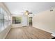 Neutral living room with lots of natural light and modern flooring at 325 Forestway Cir # 104, Altamonte Springs, FL 32701