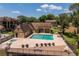 The clubhouse pool offers a refreshing oasis, surrounded by lounge areas and lush landscaping at 325 Forestway Cir # 104, Altamonte Springs, FL 32701