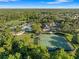 Community amenities shown include pool, clubhouse, tennis courts, sports fields, and lush landscaping at 3400 Rose Mallow Loop, Oviedo, FL 32766