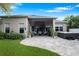 Exterior view of home featuring a covered patio, hot tub and backyard at 3400 Rose Mallow Loop, Oviedo, FL 32766