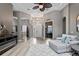 Grand entryway with high ceilings, decorative lighting, and an open floor plan at 3400 Rose Mallow Loop, Oviedo, FL 32766