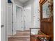 Hallway with neutral paint and doors with hard surface floors at 3400 Rose Mallow Loop, Oviedo, FL 32766