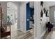 Hallway view showcasing the home's open floor plan and access to various rooms at 3400 Rose Mallow Loop, Oviedo, FL 32766