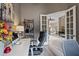 Spacious home office with open French doors to living area, offering a versatile workspace at 3400 Rose Mallow Loop, Oviedo, FL 32766
