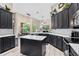 Spacious kitchen featuring an island, stainless appliances, and pendant lighting fixtures at 3400 Rose Mallow Loop, Oviedo, FL 32766