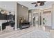 Open-concept living area with fireplace, adjoining kitchen, and a welcoming atmosphere for gatherings at 3400 Rose Mallow Loop, Oviedo, FL 32766