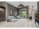 Comfortable living area showcasing neutral tones, recessed lighting, and patio access at 3400 Rose Mallow Loop, Oviedo, FL 32766
