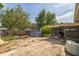 The backyard features a concrete patio and a mix of trees, including a screened-in porch and solar panels at 3711 Shady Grove Cir, Orlando, FL 32810