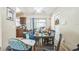 Bright dining area with a ceiling fan, and a sliding glass door for great natural lighting at 3711 Shady Grove Cir, Orlando, FL 32810