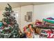 Cluttered storage area featuring a Christmas tree and boxes of belongings at 3711 Shady Grove Cir, Orlando, FL 32810