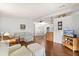 Inviting living room area featuring hardwood floors, an open concept, and comfortable seating arrangements at 38 Da Rosa Ave, Debary, FL 32713