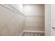 Spacious walk-in closet with ample shelving for optimal organization at 4204 Barbuda Ln, Kissimmee, FL 34758