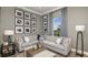 A comfortable living room features stylish decor, soft natural light, and a neutral color scheme at 4210 Barbuda Ln, Kissimmee, FL 34758