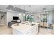 Open concept kitchen, dining, and living area offering a seamless flow at 4210 Barbuda Ln, Kissimmee, FL 34758