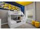 Charming bedroom features a bunk bed, cartoon wall decor, and sunny yellow accents at 4375 Scene Ln, Kissimmee, FL 34746