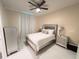 Comfortable bedroom features a ceiling fan, closet, and space for relaxing at 4412 Conroy Club Dr, Orlando, FL 32835