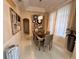 Elegant dining room featuring modern light fixtures, decor mirrors, and neutral color palette at 4412 Conroy Club Dr, Orlando, FL 32835