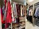 Bright, spacious walk-in closet with custom shelving and ample hanging space for clothes and shoe storage at 4412 Conroy Club Dr, Orlando, FL 32835