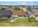 Aerial view showcasing the home's backyard with patio, pergola, and fire pit in a Gathering-friendly neighborhood at 4608 Atwood Dr, Orlando, FL 32828