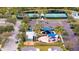 Aerial view of a community recreation area with tennis courts, playground, and green spaces at 4608 Atwood Dr, Orlando, FL 32828