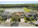 Aerial view of home with lake view, showcasing lush greenery and water at 4608 Atwood Dr, Orlando, FL 32828
