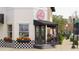 Charming bakery exterior with outdoor seating and a visible 'The Bakery' sign at 4608 Atwood Dr, Orlando, FL 32828