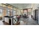 Large, airy clubhouse featuring a dining area, fireplace, and a functional wet bar with comfortable seating at 4608 Atwood Dr, Orlando, FL 32828