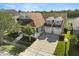 Aerial view of a beautiful two-story home with a three-car garage at 4608 Atwood Dr, Orlando, FL 32828