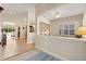Bright foyer featuring an open floor plan with tile flooring, arches, and views to other living spaces at 4608 Atwood Dr, Orlando, FL 32828