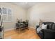 Home office with shuttered window, sleek desk, and black leather chair at 4608 Atwood Dr, Orlando, FL 32828